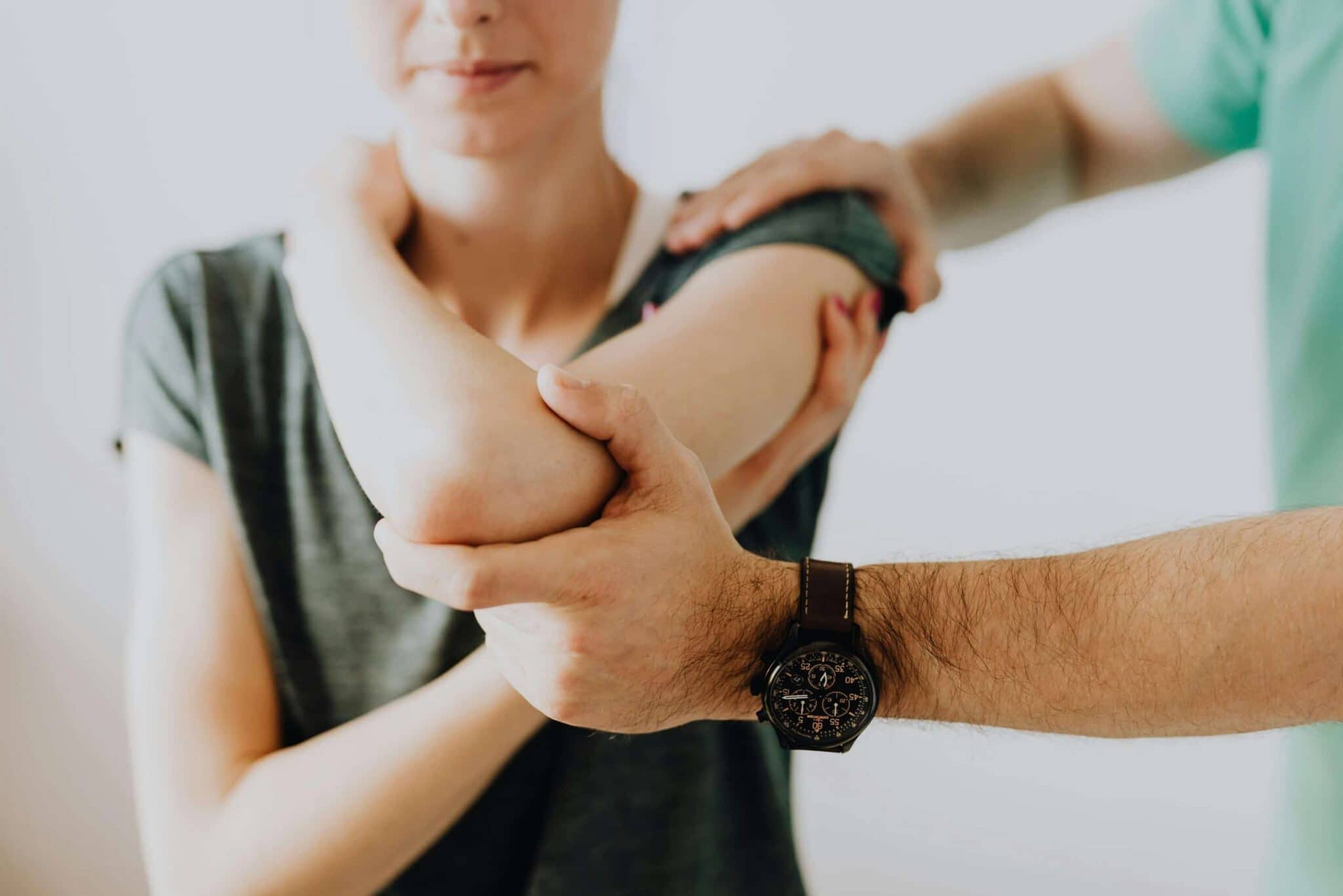 Chiropractor providing attentive hands-on care