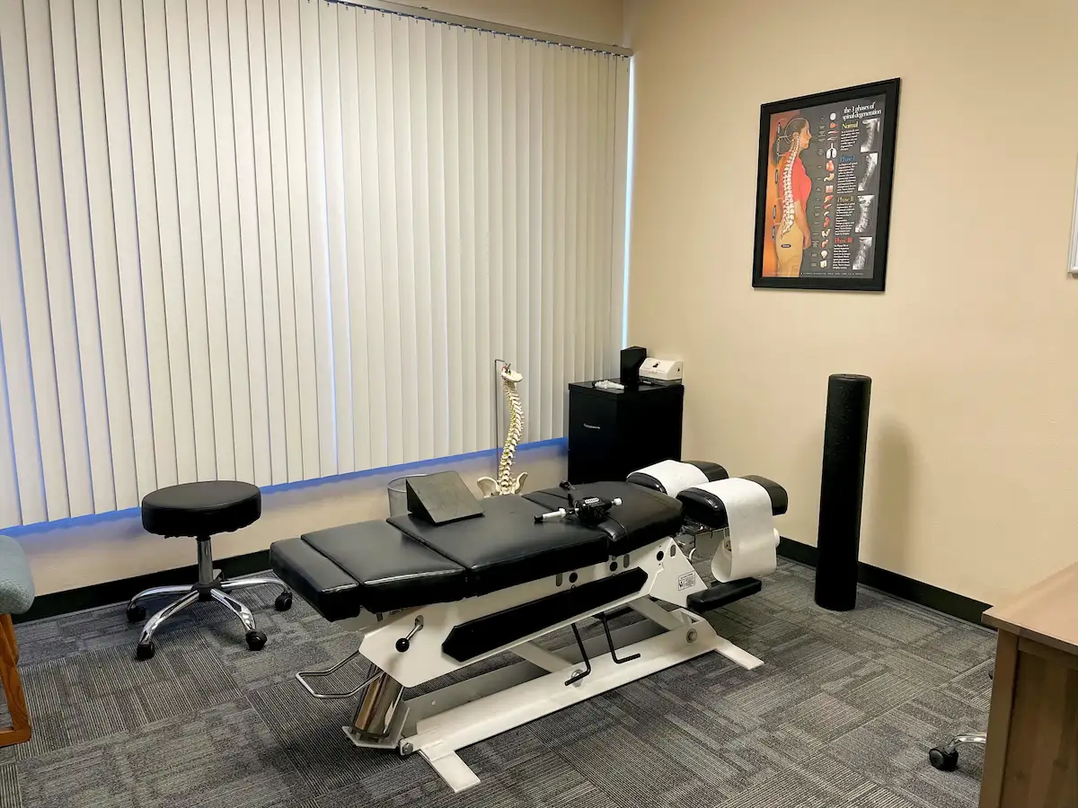 Chiropractic treatment room with adjustment table