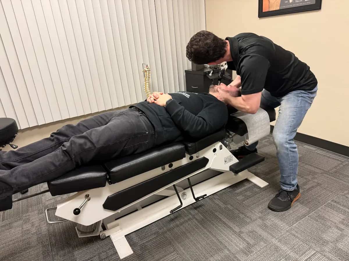 Neck adjustment performed by chiropractor